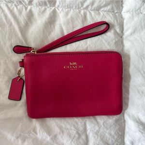 Hot pink coach wristlet